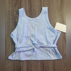 Lululemon it’s a tie tank top.Can be worn in multiple ways.Light blue.Windmill.6